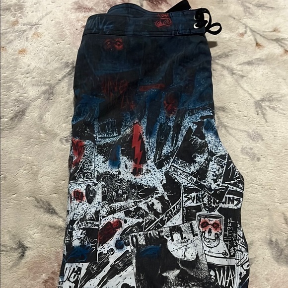 O'Neill Black and Red Board Shorts with Dynamic Design - Picture 3 of 6